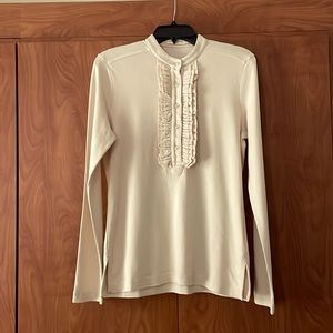 Classic Tory Burch ruffle front long sleeve knit top.